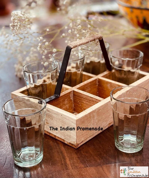 Cutting chai glasses with rustic wooden stand