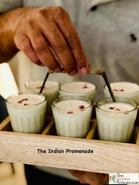 Cutting chai glasses with rustic wooden stand