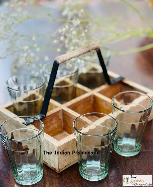 Cutting chai glasses with rustic wooden stand