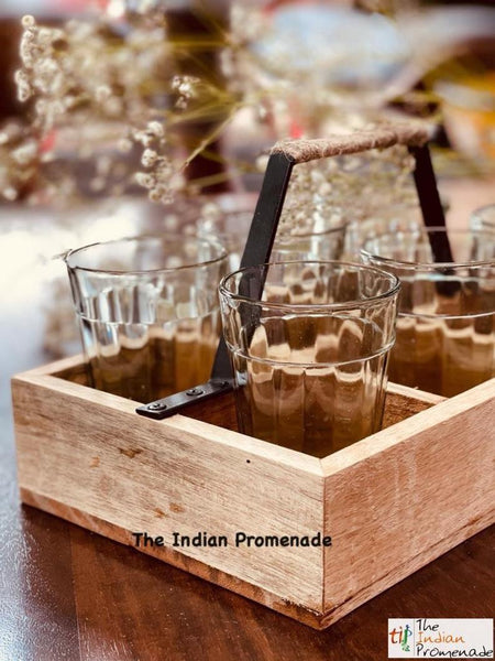Cutting chai glasses with rustic wooden stand
